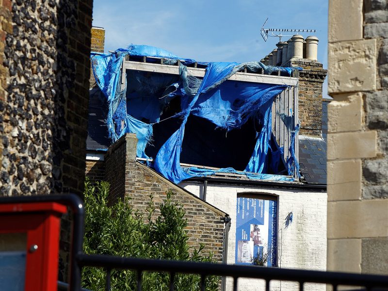 Roof repair work on a pitched roof